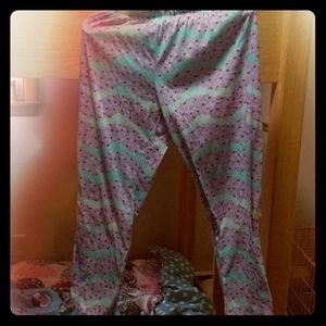 Kids blue pajama pants with purple polka dots